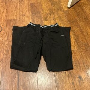 Small black scrub pants